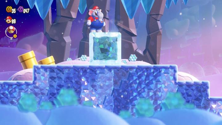 Elefant Mario steht in Super Mario Bros. Wonder auf einem Eisblock.