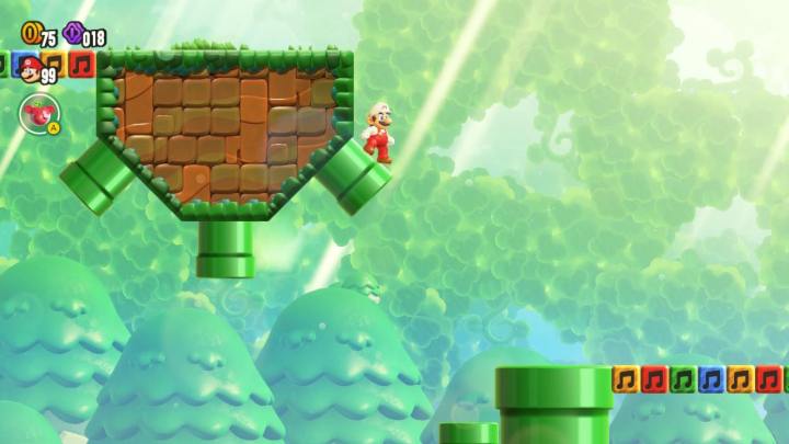 Mario steht in Super Mario Bros. Wonder auf einem Rohr.