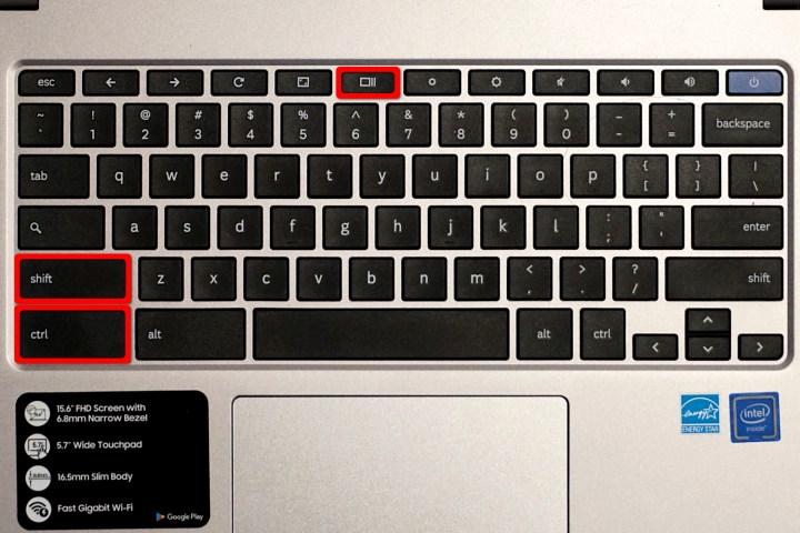 Eine Chromebook-Tastatur mit drei rot hervorgehobenen Tasten.