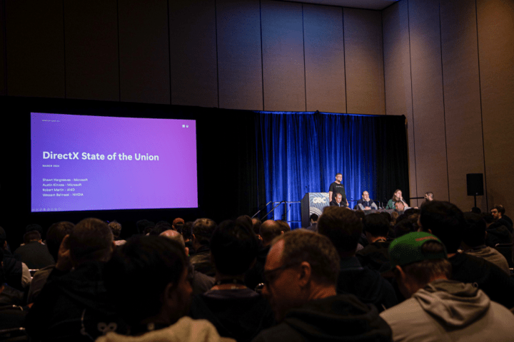 Microsoft-Moderatoren auf der Bühne einer GDC-Sitzung.