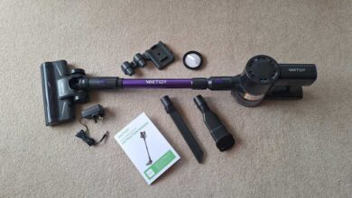 A view of the Vac Tidy Blitz V8 Pro Cordless Vacuum Cleaner with attachments and manual