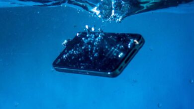 A smartphone falling into water