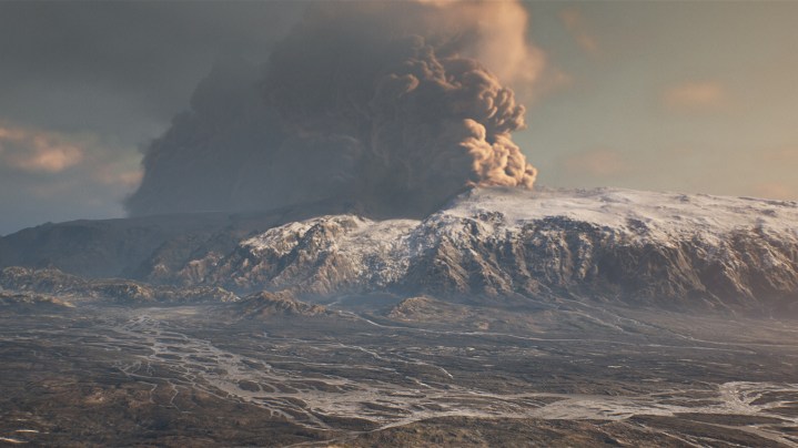 Ein Inselvulkan, aus dem Rauch aufsteigt.