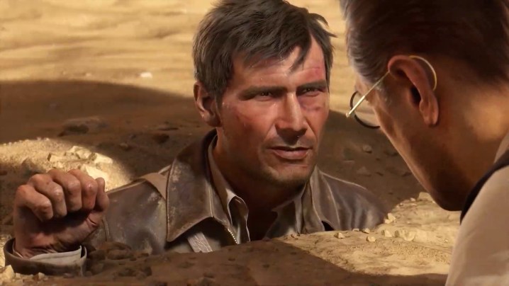 Indiana Jones im Sand begraben.
