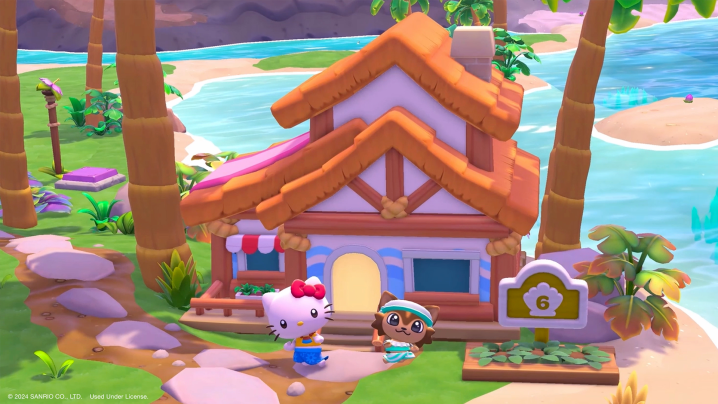 Hello Kitty steht in Hello Kitty: Island Adventure vor einem Haus.